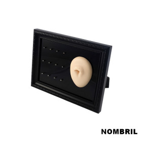 Cadre présentoir à piercings avec modèle en silicone - nombril Cadre présentoir à piercings avec modèle en silicone - nombril