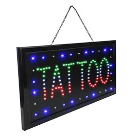 Insegna luminosa per negozio di tatuaggi