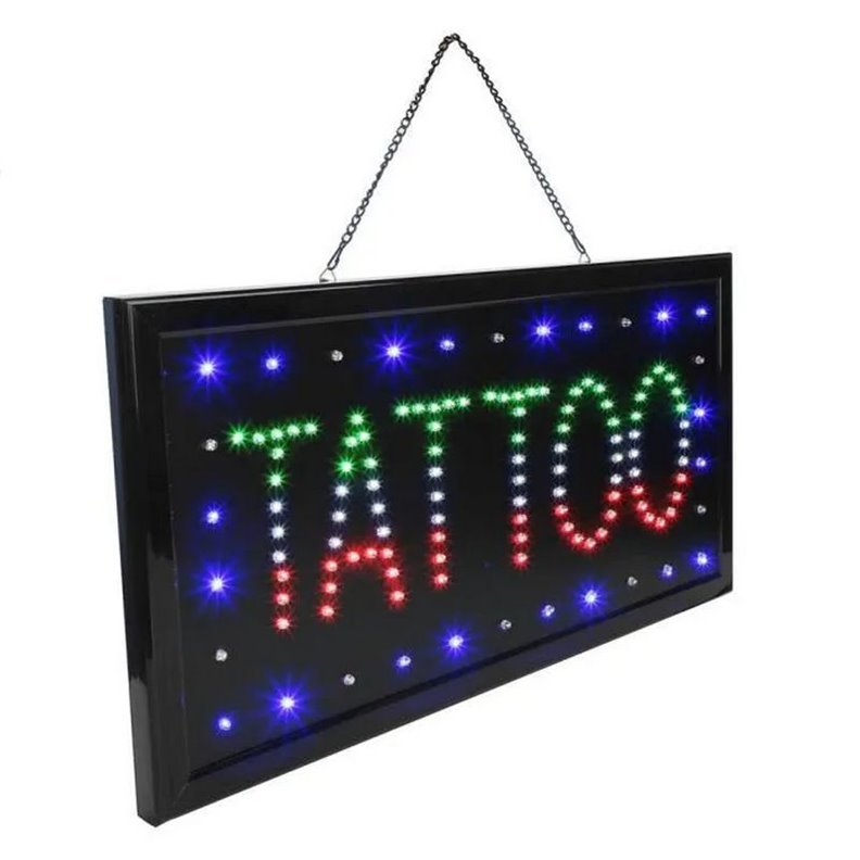 Insegna luminosa per negozio di tatuaggi